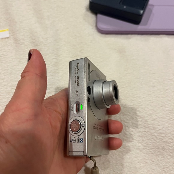 Canon PowerShot SD1000 7.1MP Digital Elph Camera with 3x Optical Zoom - Picture 11 of 12